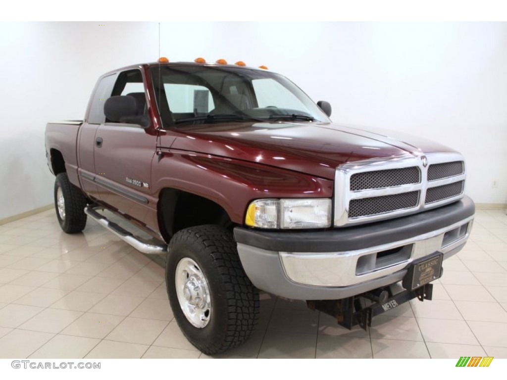 2001 Ram 2500 SLT Quad Cab 4x4 - Dark Garnet Red Pearl / Agate photo #1