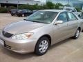 2003 Desert Sand Mica Toyota Camry LE  photo #1
