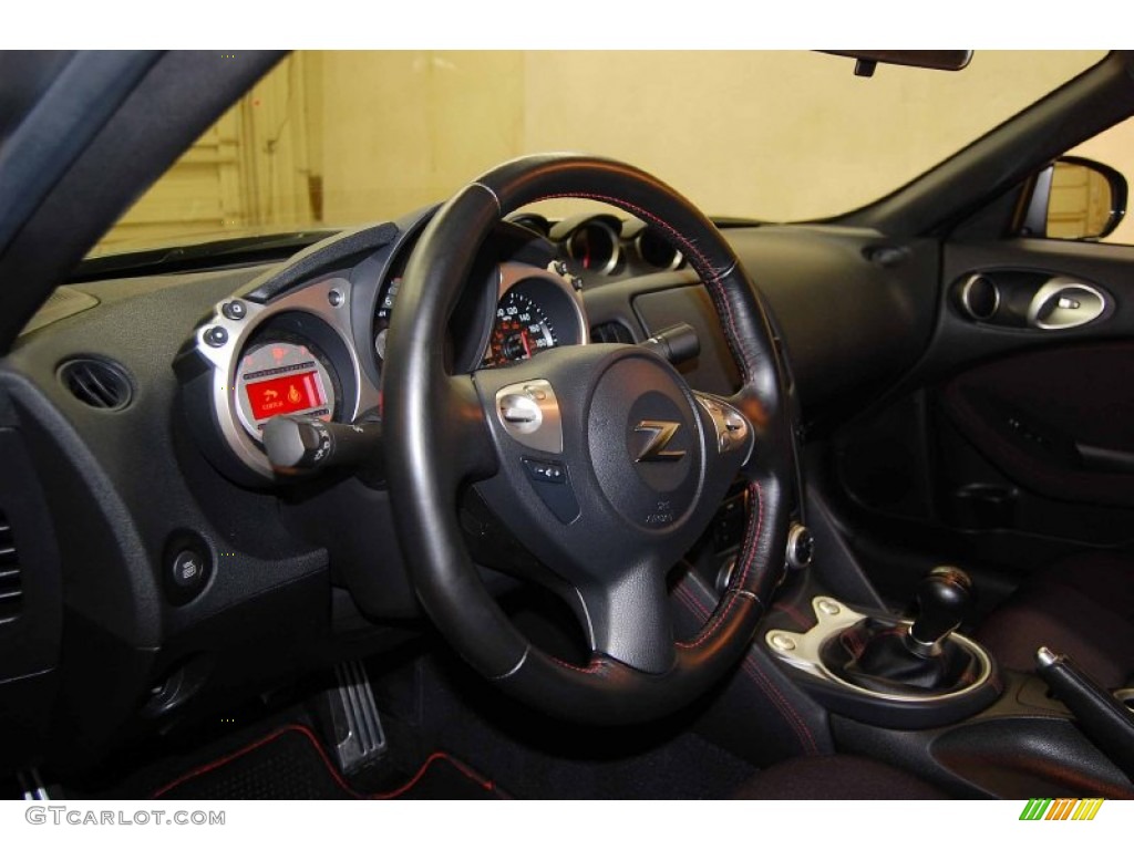 2010 Nissan 370Z NISMO Coupe NISMO Black/Red Cloth Steering Wheel Photo #66496311