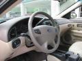 2002 Ford Taurus Medium Parchment Interior Steering Wheel Photo