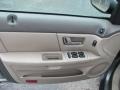 Medium Parchment 2002 Ford Taurus SES Door Panel