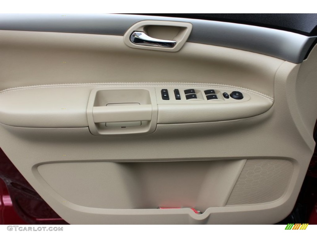 2010 Saturn Outlook XE Tan Door Panel Photo #66512970