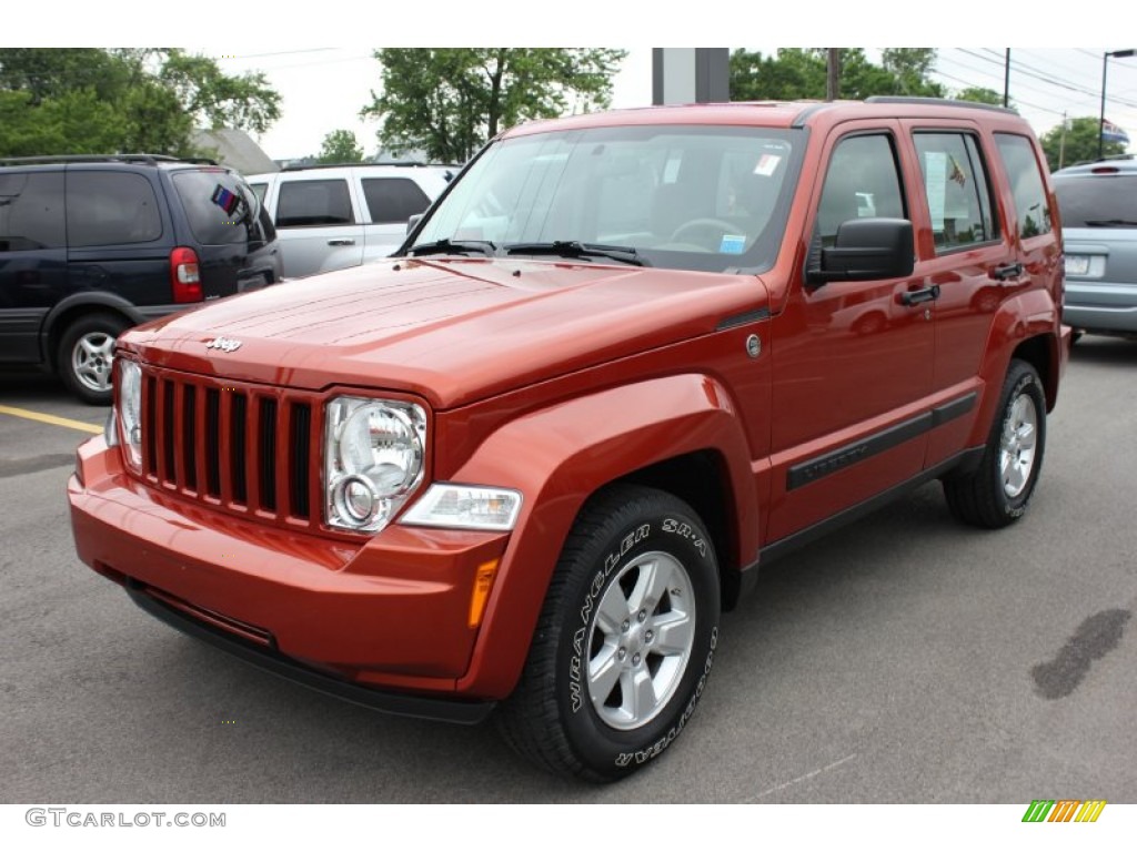 2009 Liberty Sport 4x4 - Sunburst Orange Pearl / Pastel Pebble Beige Mckinley Leather photo #1