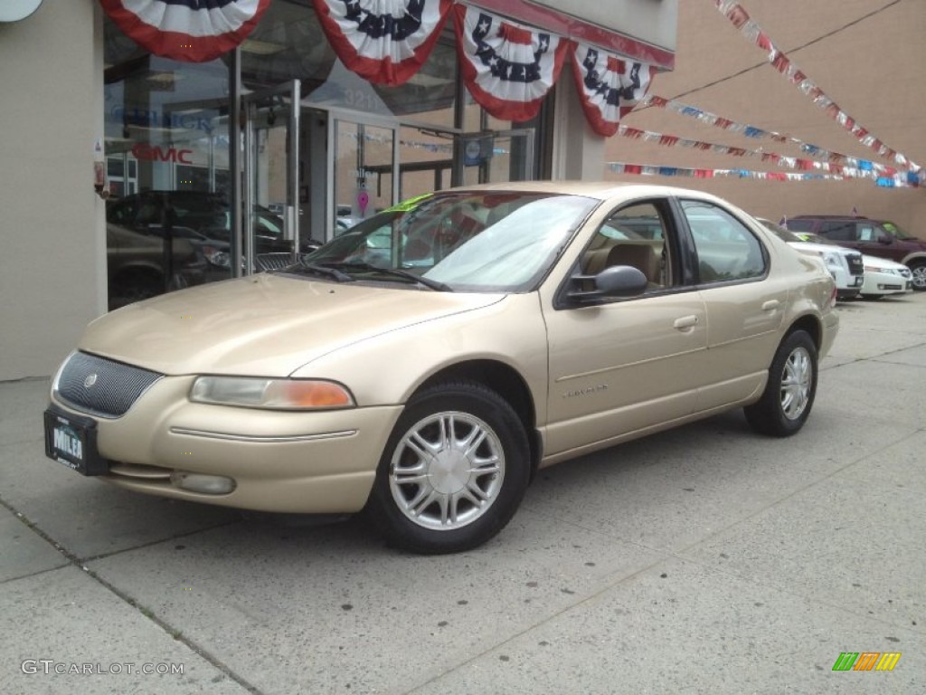 1998 Cirrus LXi - Champagne Pearl Metallic / Camel photo #1