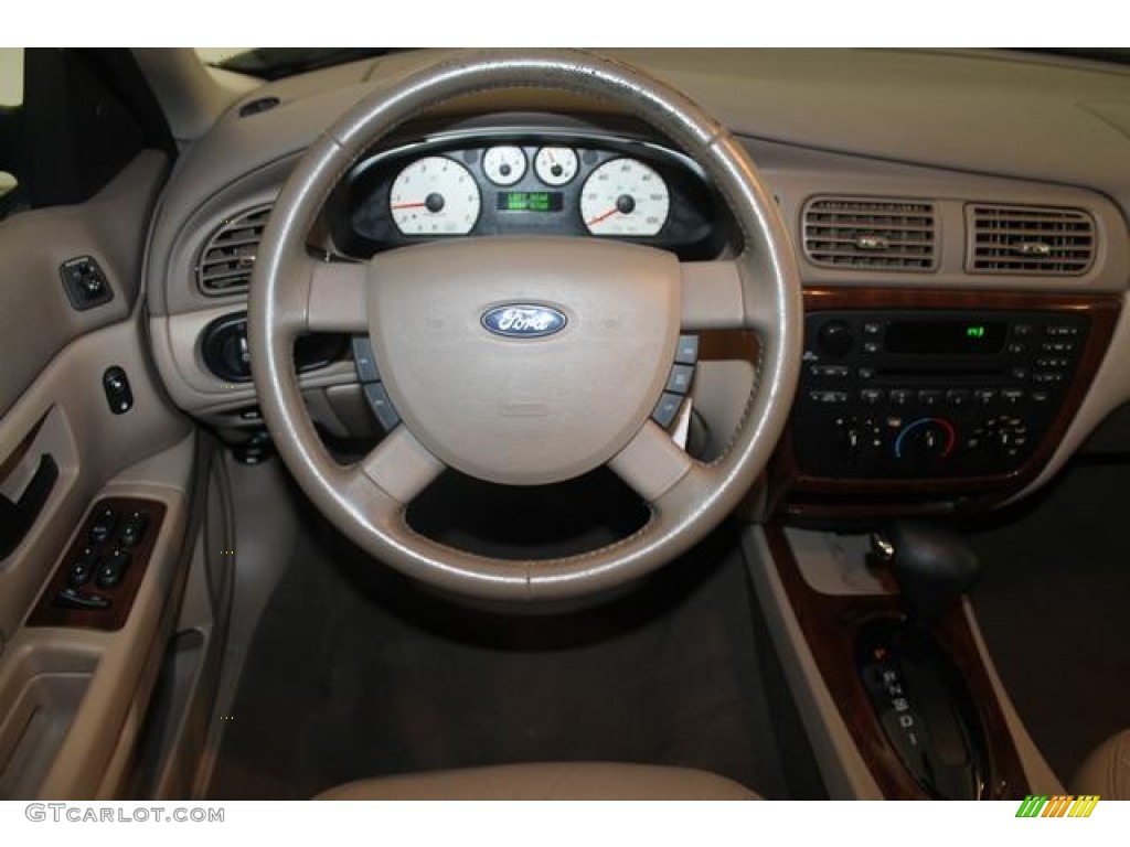 2007 Ford Taurus SEL Medium/Dark Pebble Steering Wheel Photo #66535152