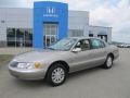 Light Parchment Gold Metallic 2002 Lincoln Continental 