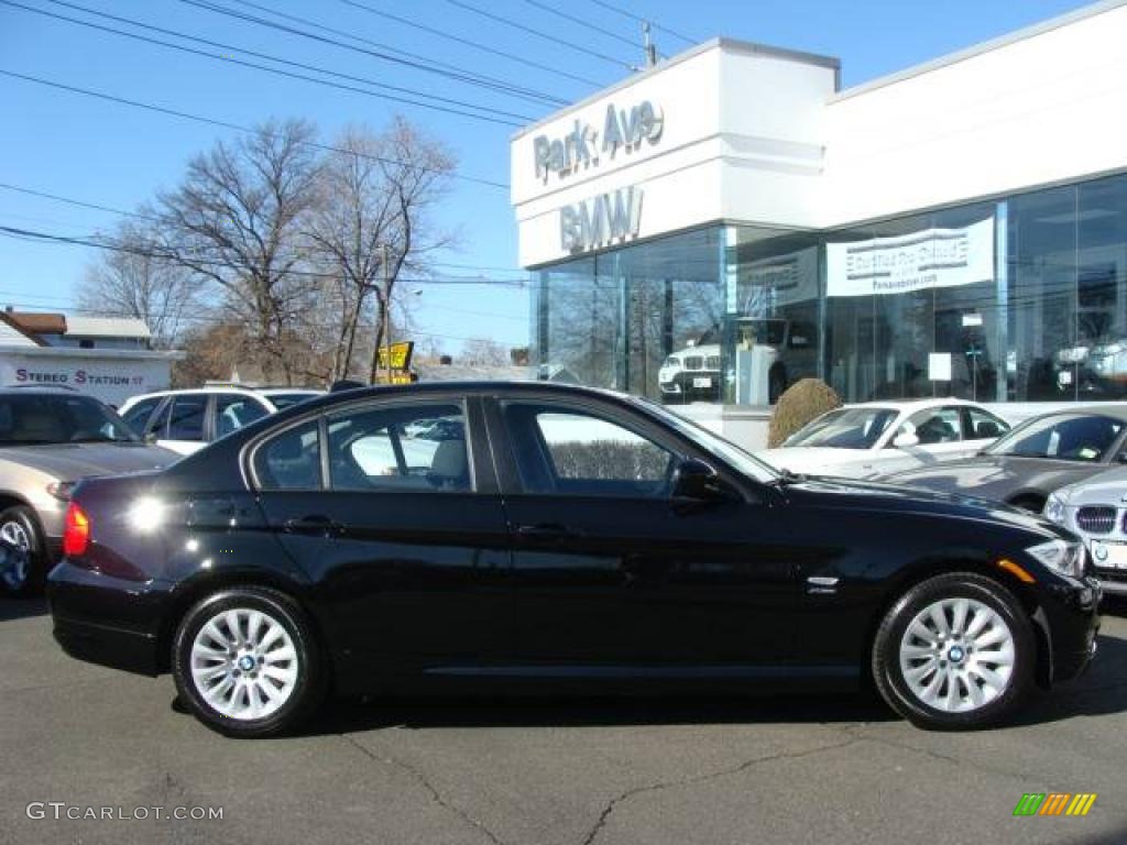 2009 3 Series 328xi Sedan - Jet Black / Black photo #1