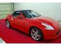 2010 Solid Red Nissan 370Z Sport Touring Roadster  photo #1