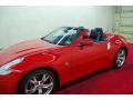 2010 Solid Red Nissan 370Z Sport Touring Roadster  photo #9