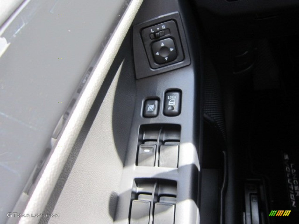 2012 Mitsubishi Lancer Evolution GSR Controls Photo #66571053
