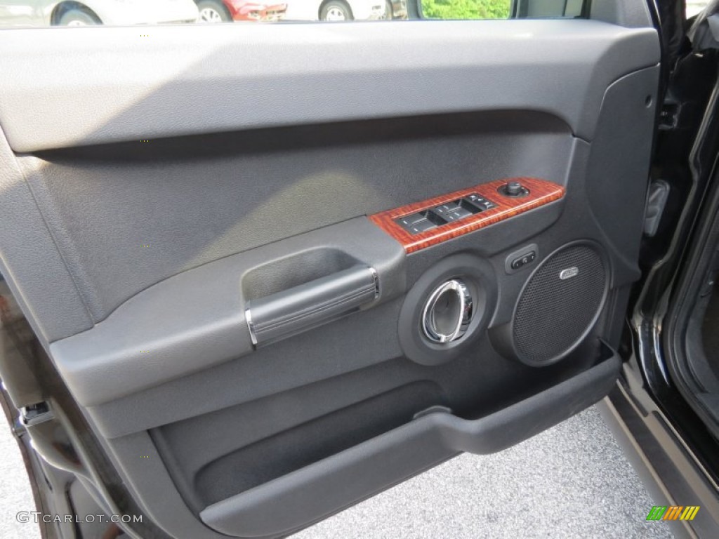 2009 Jeep Commander Limited 4x4 Saddle Brown Door Panel Photo #66588534