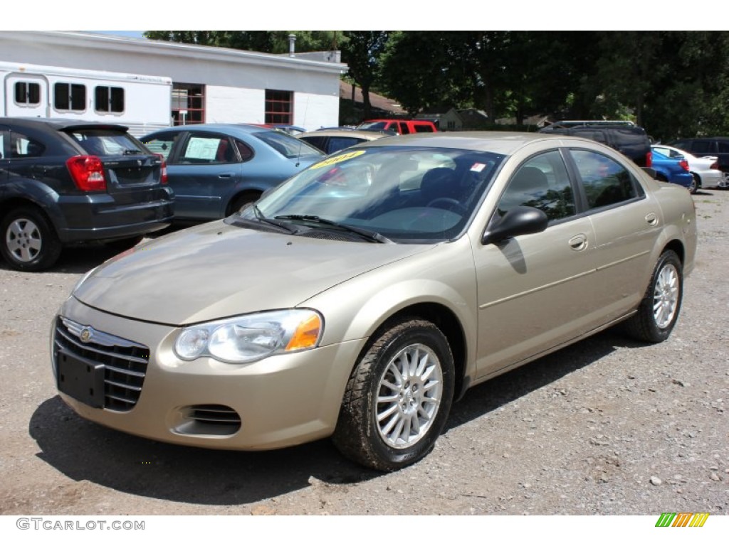 2004 Sebring Touring Sedan - Light Almond Pearl Metallic / Dark Slate Gray photo #1