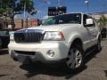 F6 - Ceramic White Tri Coat Lincoln Aviator (2004)