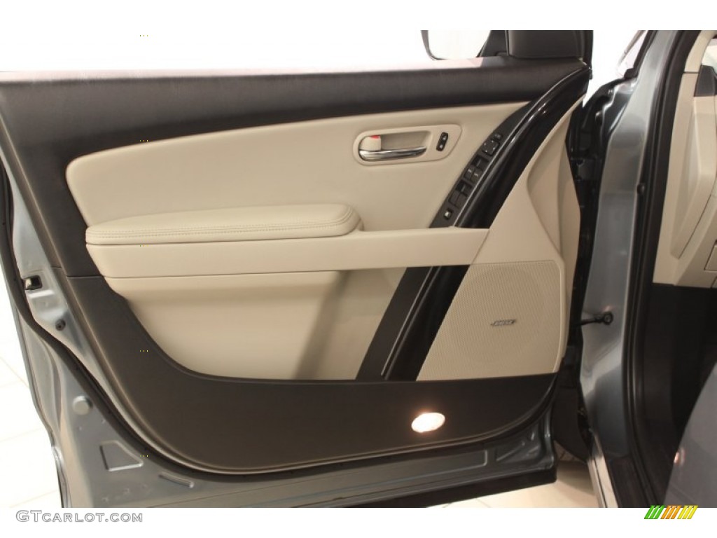 2011 Mazda CX-9 Touring AWD Sand Door Panel Photo #66648140