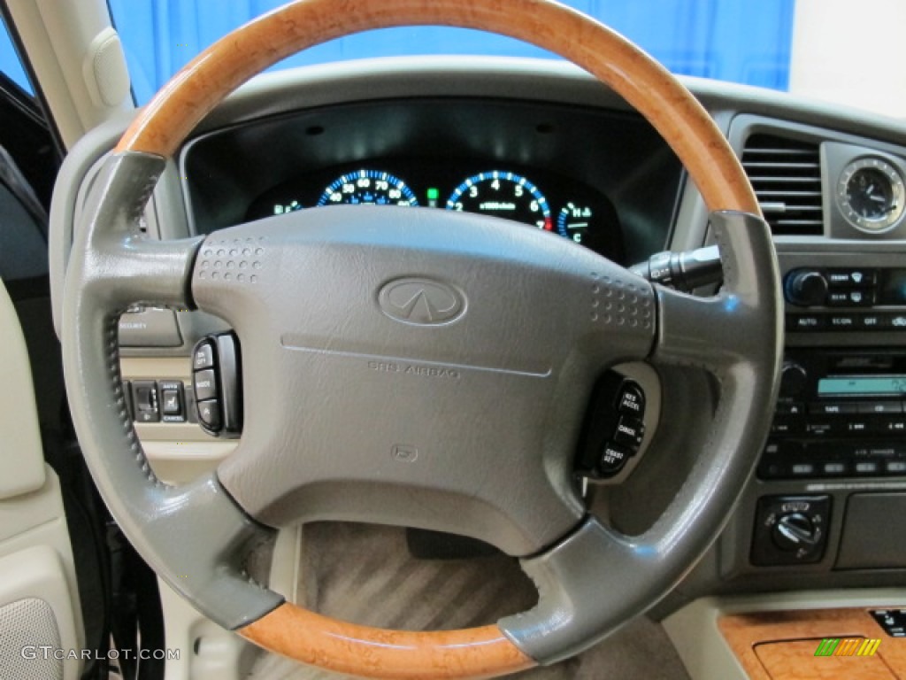 2001 QX4 4x4 - Black Obsidian / Stone Beige photo #34