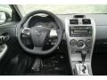 Dark Charcoal Dashboard Photo for 2012 Toyota Corolla #66655344