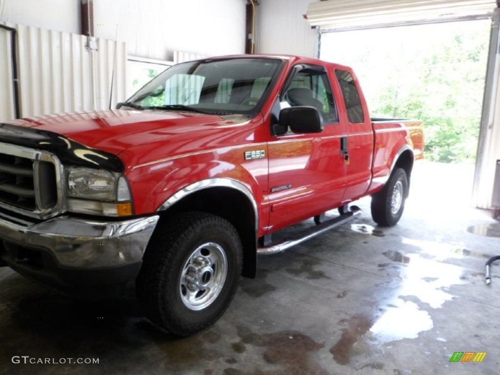 2002 F250 Super Duty Lariat SuperCab 4x4 - Red Clearcoat / Medium Parchment photo #2