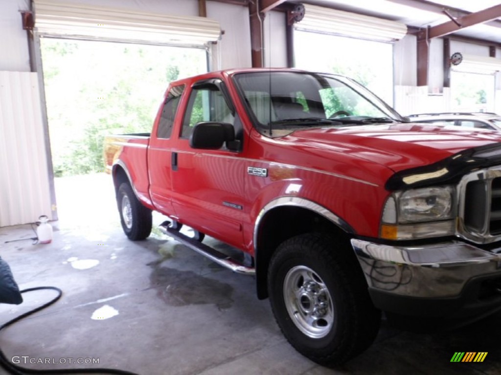 2002 F250 Super Duty Lariat SuperCab 4x4 - Red Clearcoat / Medium Parchment photo #3