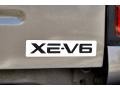 2003 Nissan Frontier XE V6 Crew Cab Badge and Logo Photo