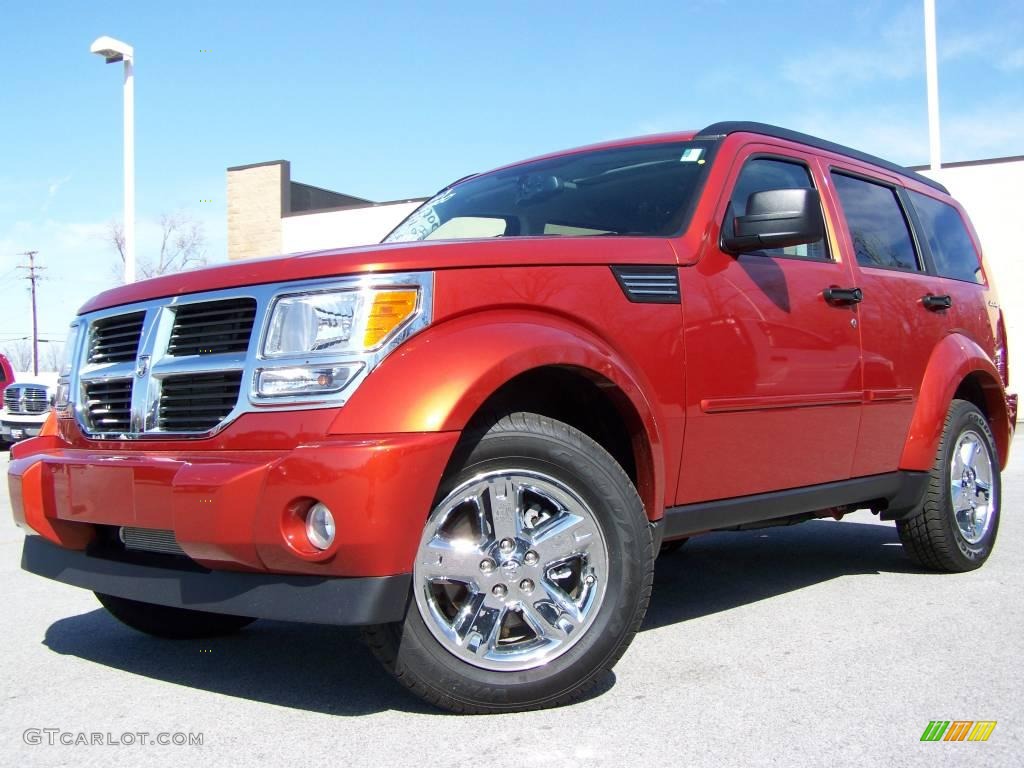 2009 Nitro SLT 4x4 - Sunburst Orange Pearl / Dark Slate Gray/Light Slate Gray photo #1