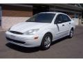 2003 Cloud 9 White Ford Focus SE Sedan  photo #1