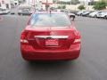 2009 Red Alert Nissan Versa 1.8 SL Sedan  photo #6