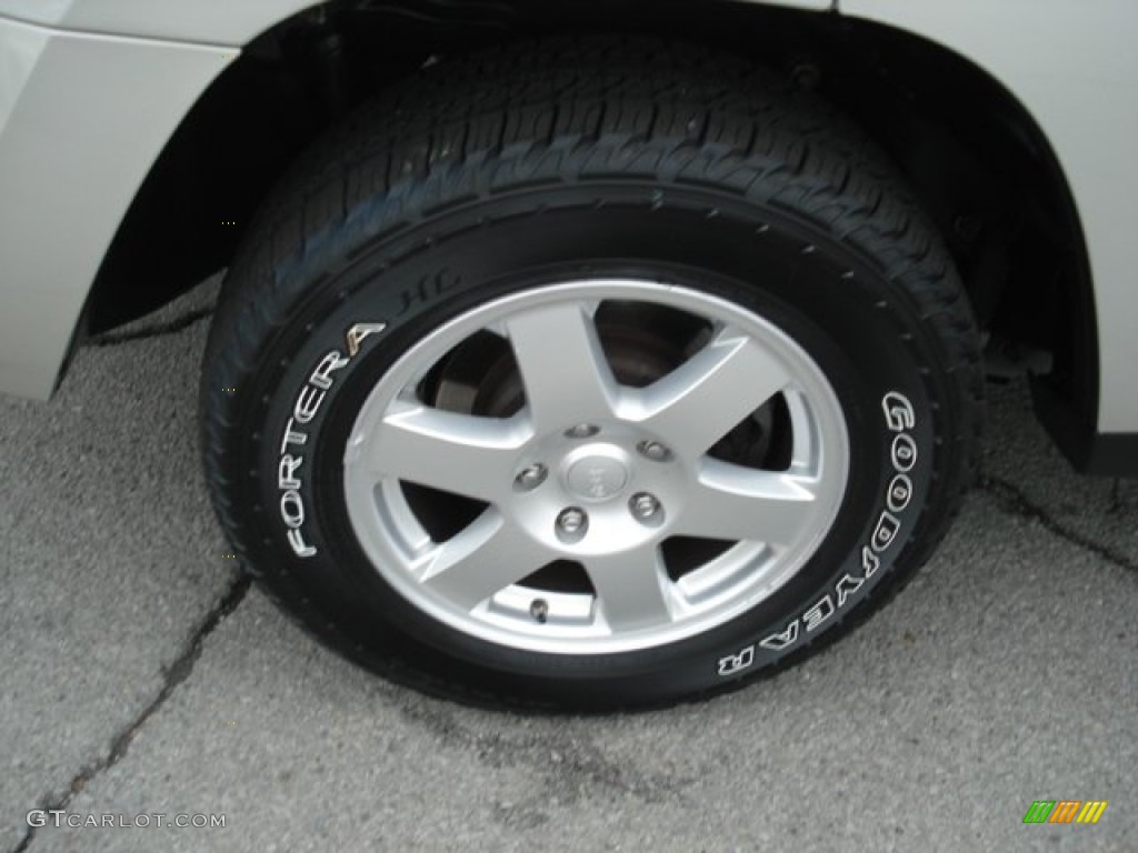 2009 Jeep Grand Cherokee Laredo 4x4 Wheel Photo #66781367