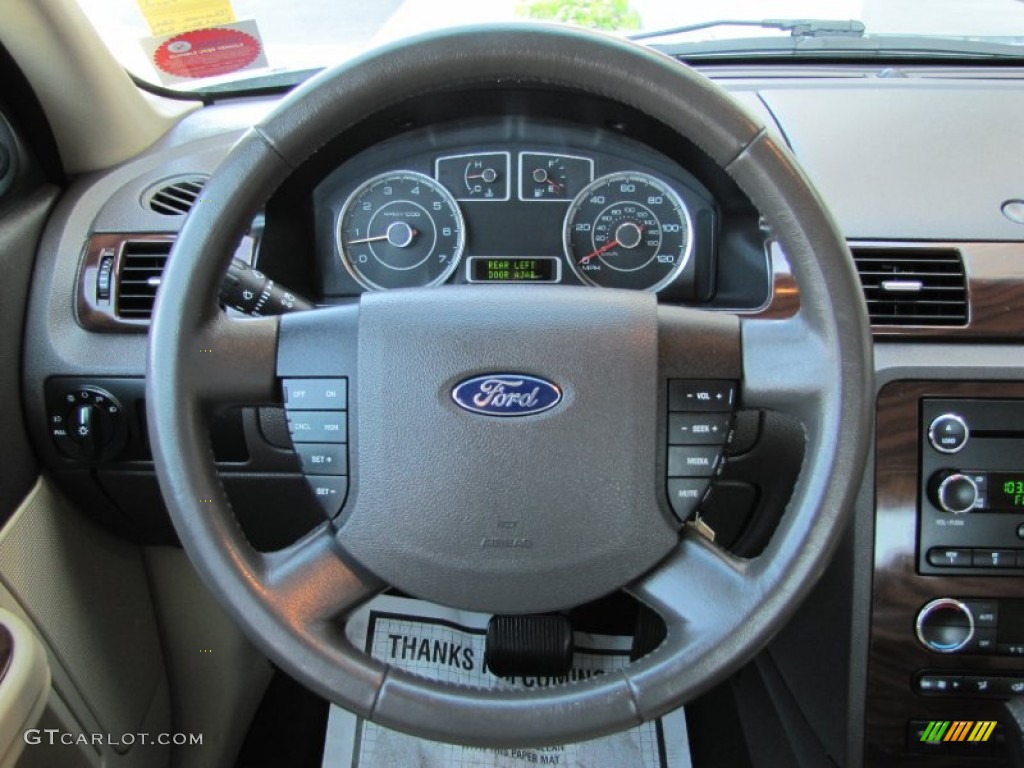 2009 Ford Taurus SEL AWD Camel Steering Wheel Photo #66828434