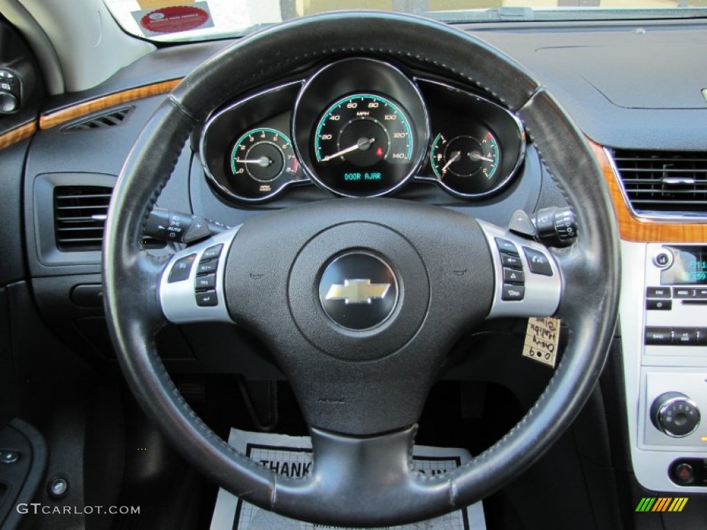 2009 Chevrolet Malibu LT Sedan Ebony Steering Wheel Photo #66830046