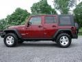2009 Red Rock Crystal Pearl Jeep Wrangler Unlimited Rubicon 4x4  photo #4