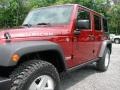 2009 Red Rock Crystal Pearl Jeep Wrangler Unlimited Rubicon 4x4  photo #17
