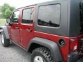 2009 Red Rock Crystal Pearl Jeep Wrangler Unlimited Rubicon 4x4  photo #20