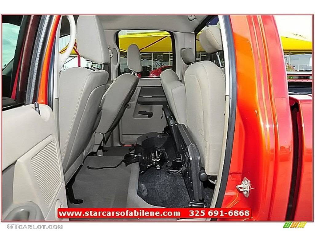 2007 Ram 1500 Lone Star Quad Cab 4x4 - Sunburst Orange Pearl / Khaki Beige photo #29