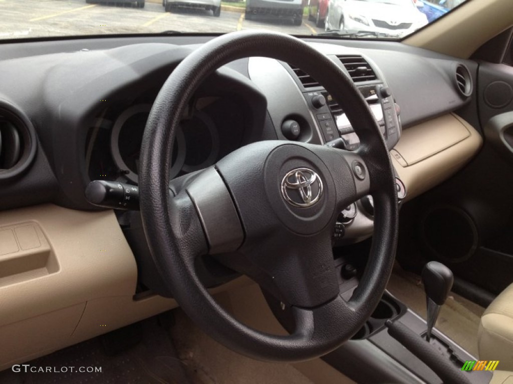 2011 Toyota RAV4 I4 4WD Sand Beige Steering Wheel Photo #66865868