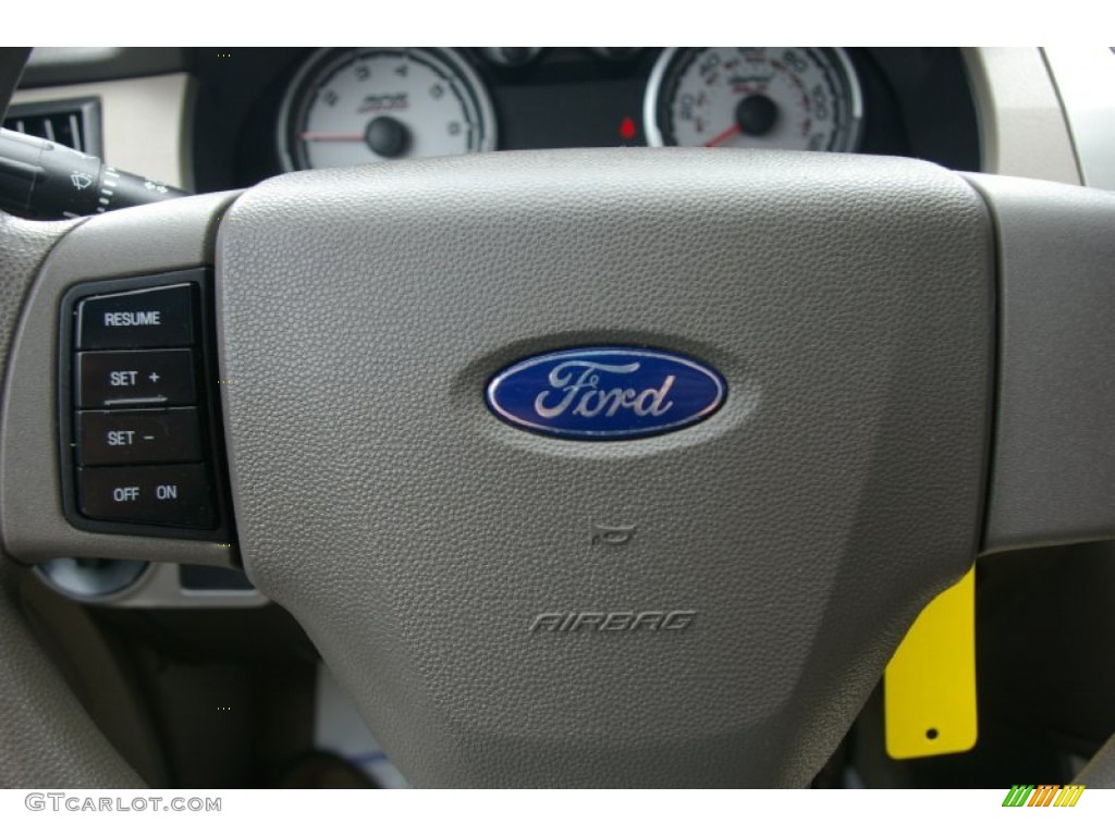 2009 Focus SE Sedan - Light Ice Blue Metallic / Medium Stone photo #9