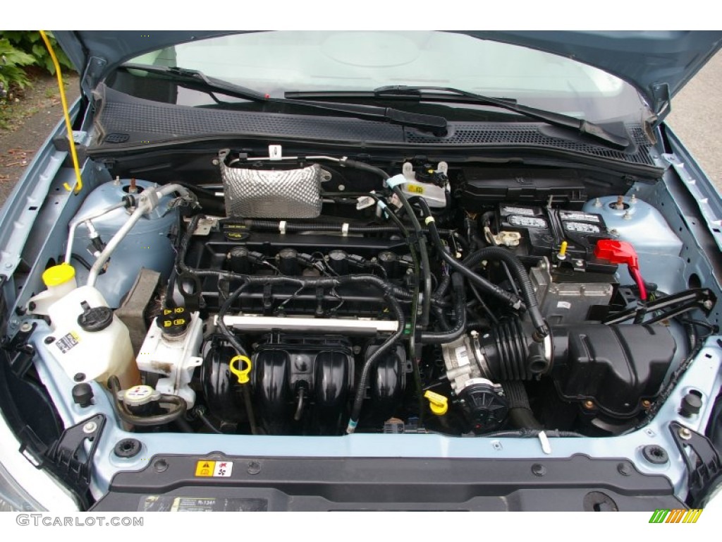 2009 Focus SE Sedan - Light Ice Blue Metallic / Medium Stone photo #18