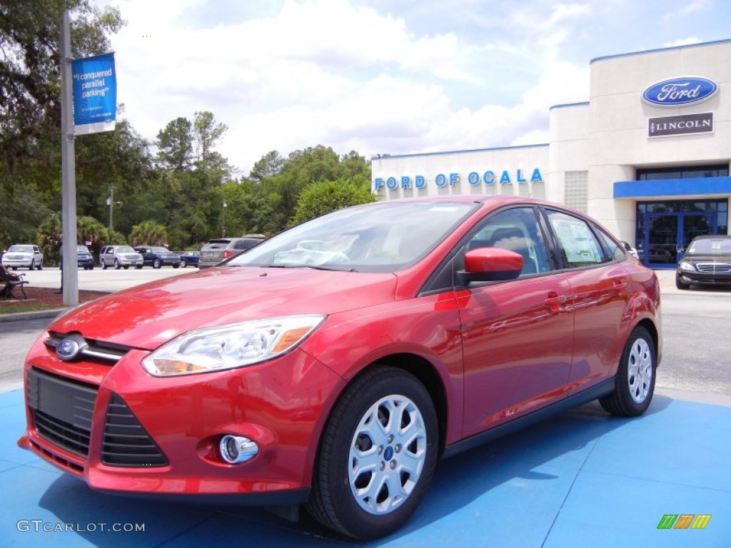 2012 Focus SE Sedan - Red Candy Metallic / Stone photo #1