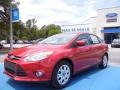 2012 Red Candy Metallic Ford Focus SE Sedan  photo #1