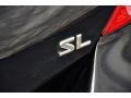 2011 Super Black Nissan Versa 1.8 SL Hatchback  photo #7