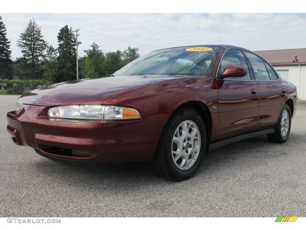 2000 Intrigue GL - Ruby Red Metallic / Dark Gray photo #1