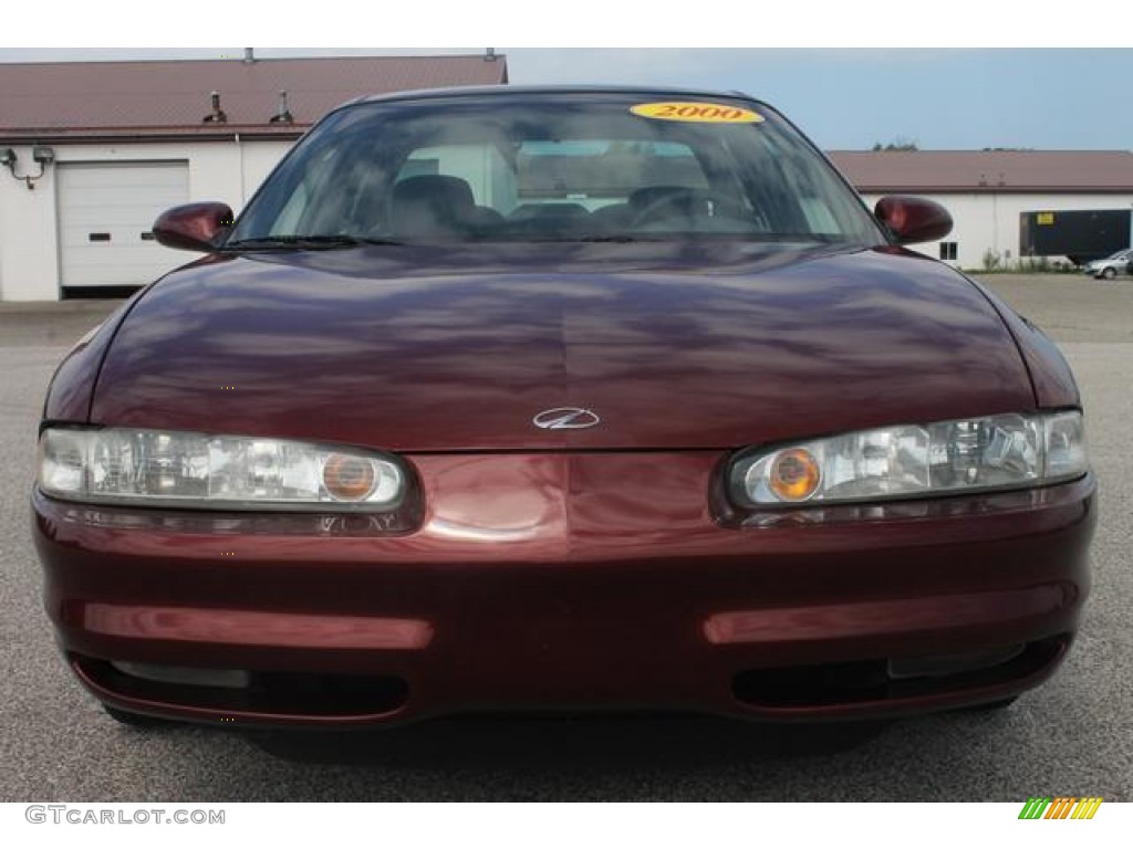 Ruby Red Metallic 2000 Oldsmobile Intrigue GL Exterior Photo #66936169