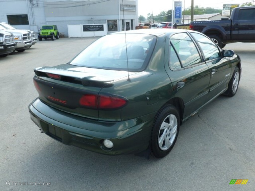 2001 Sunfire SE Sedan - Spruce Green Metallic / Graphite photo #5