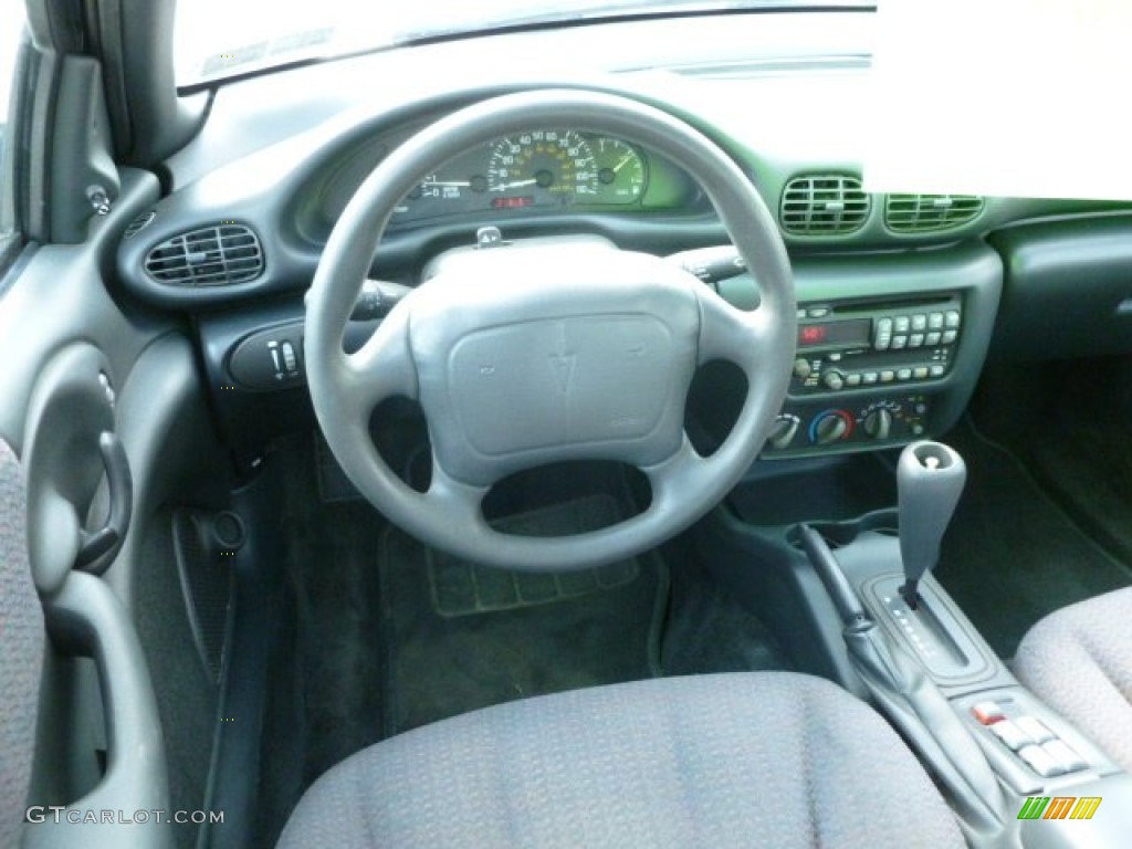 2001 Sunfire SE Sedan - Spruce Green Metallic / Graphite photo #14