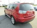 2010 Rally Red Metallic Mitsubishi Outlander SE  photo #3