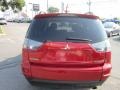 2010 Rally Red Metallic Mitsubishi Outlander SE  photo #4