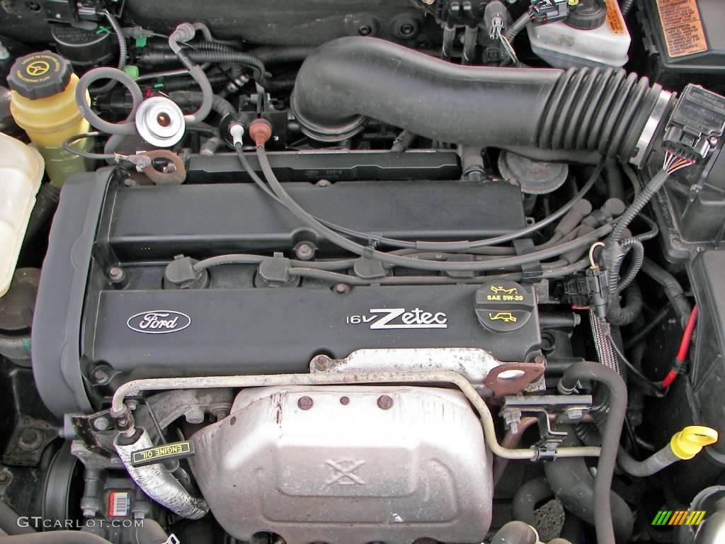 2004 Focus SE Sedan - Pitch Black / Medium Graphite photo #24