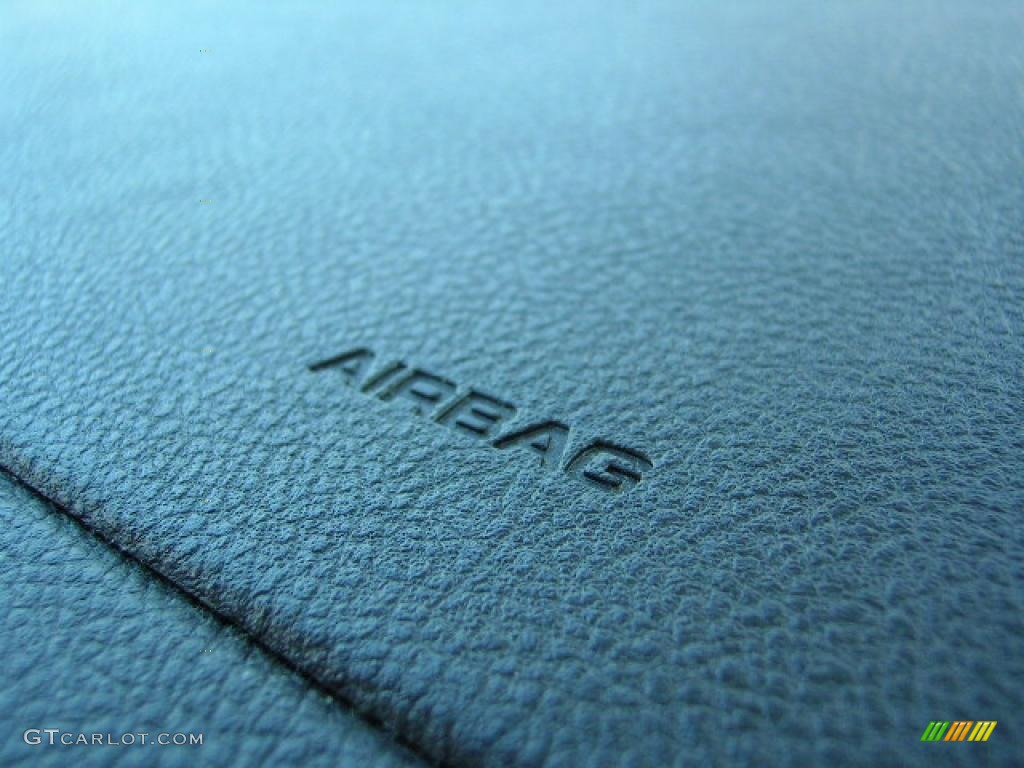 2005 Focus ZX4 ST Sedan - Pitch Black / Charcoal/Charcoal photo #7