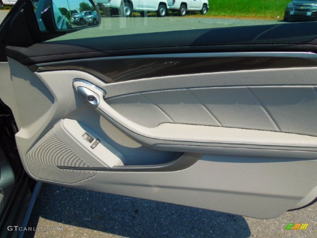 2012 Cadillac CTS Coupe Light Titanium/Ebony Door Panel Photo #67002430