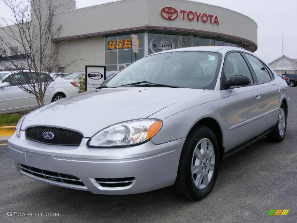 Silver Frost Metallic Ford Taurus