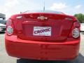 2012 Victory Red Chevrolet Sonic LS Sedan  photo #6
